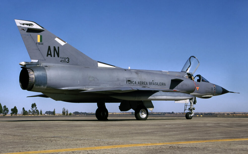 Gray Brazilian Air Force Mirage fighter parked on the runway
